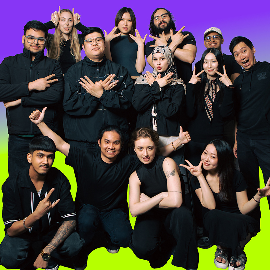 A group photo of a diverse creative thinkers and designers